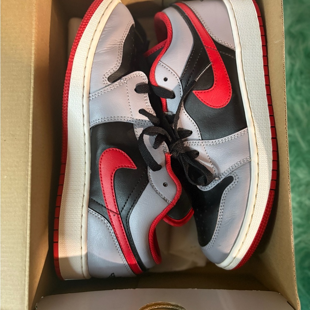 Air Jordan 1 Low Sneakers in Black, Red, and Gray